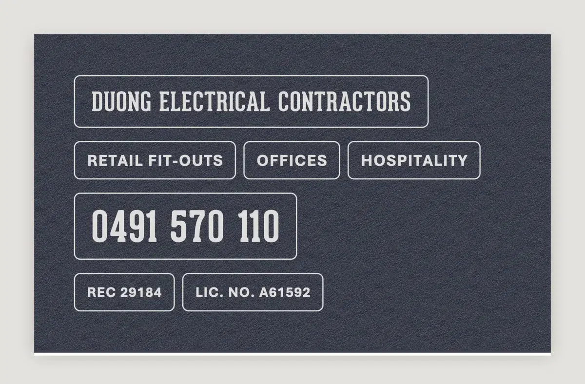 Navy electrician business card, rows of label tape segments with company name phone and licence lines, back, 90 x 55 mm