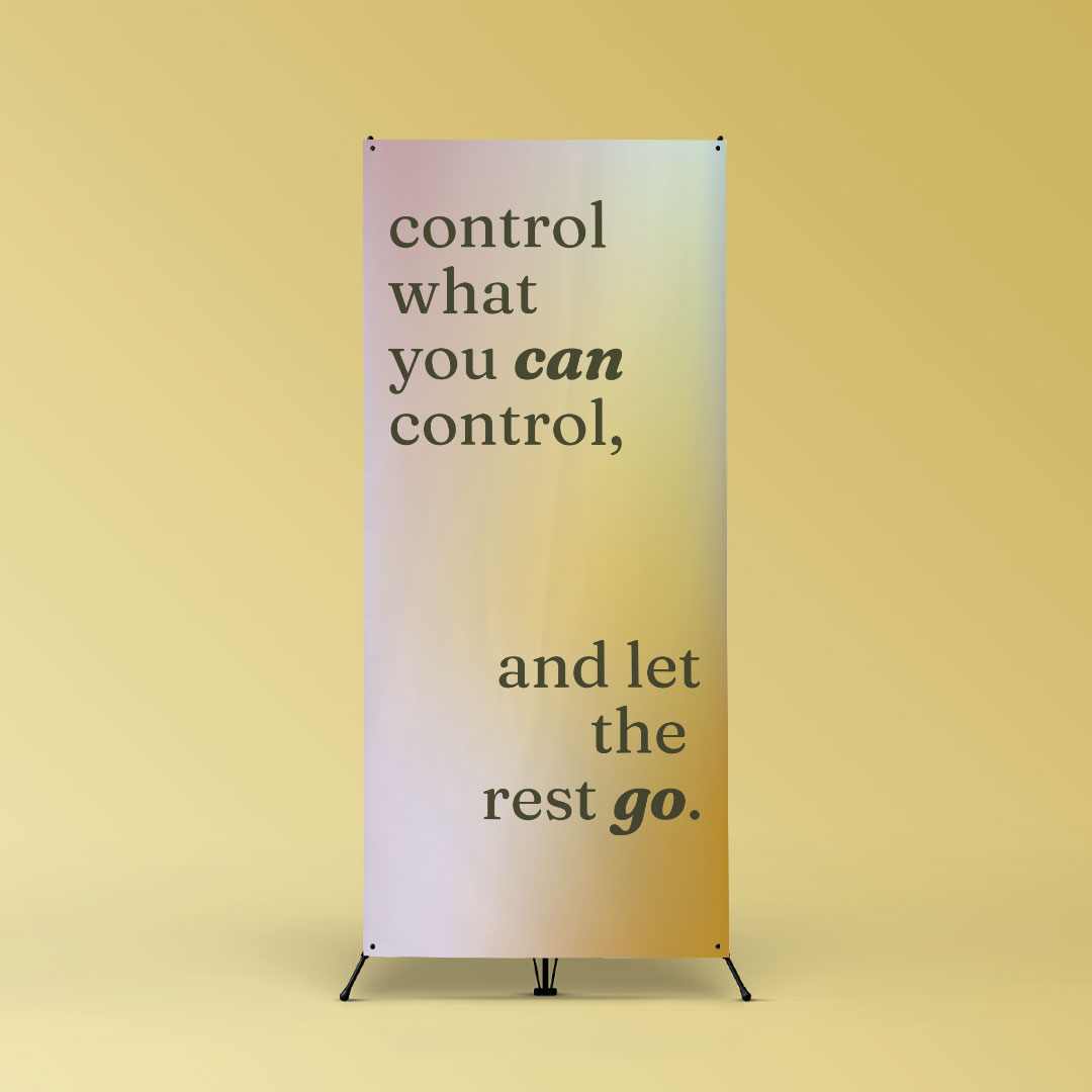 A printed Paperlust X-banner standee display on a folding stand