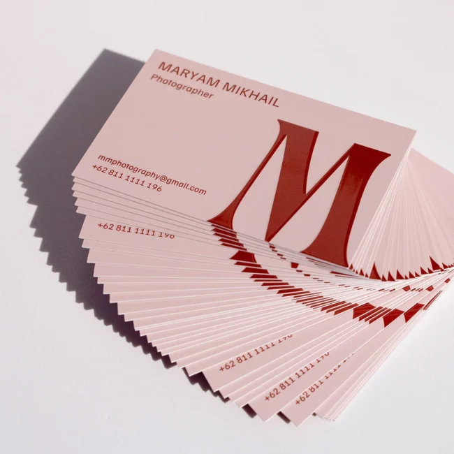 Business card with Scodix raised digital emboss · 350gsm smooth stock · full-colour digital print · Scodix raised gloss