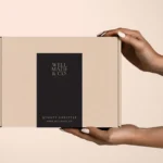 Business sticker label on kraft shipping box