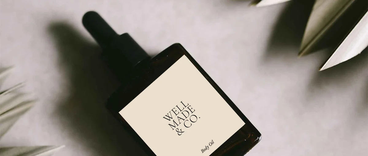 Business product label sticker on body oil bottle