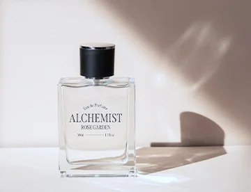 Clear sticker label on cosmetic perfume bottle