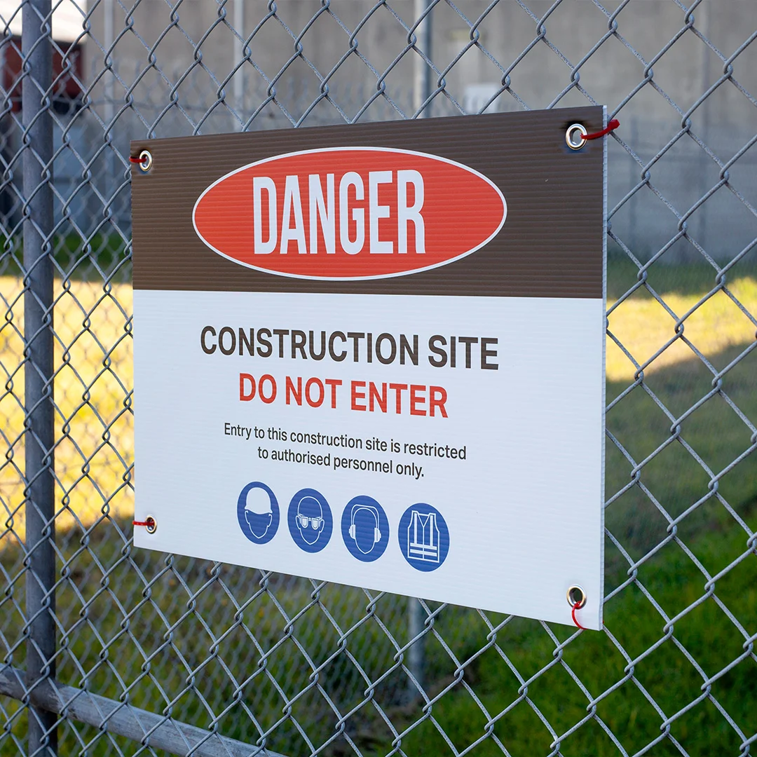 Corflute construction site danger sign with grommets and cable ties