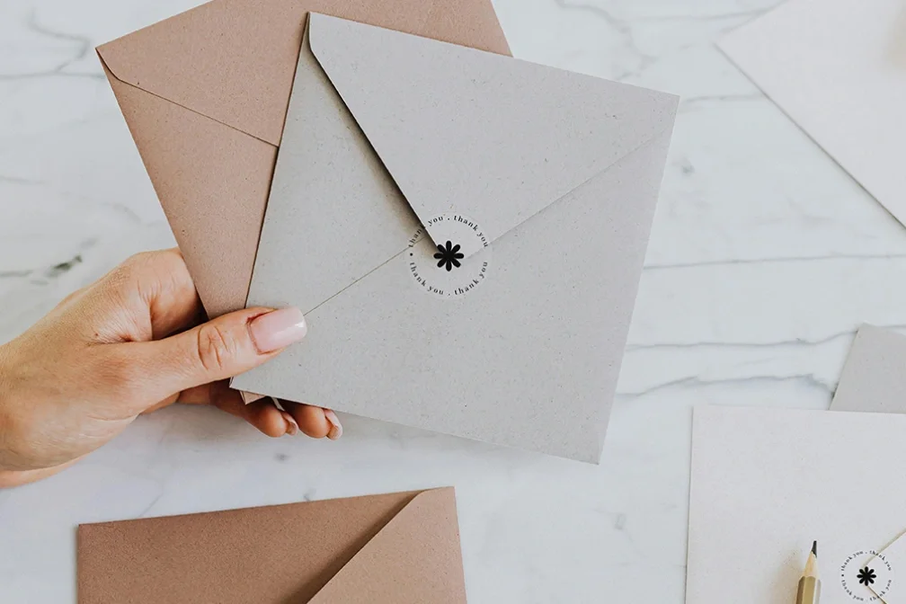 Round thank you sticker used as envelope seal