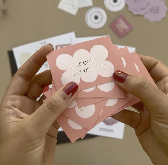 Foil and digital stickers used as branded packaging inserts
