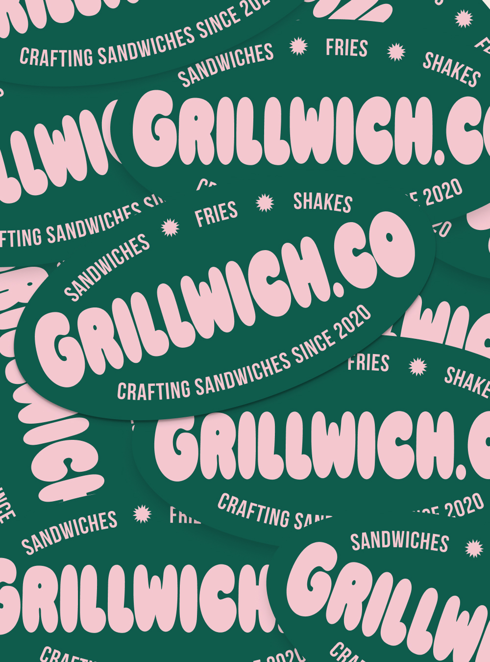 Stack of branded die-cut stickers for agency merchandise and giveaways.