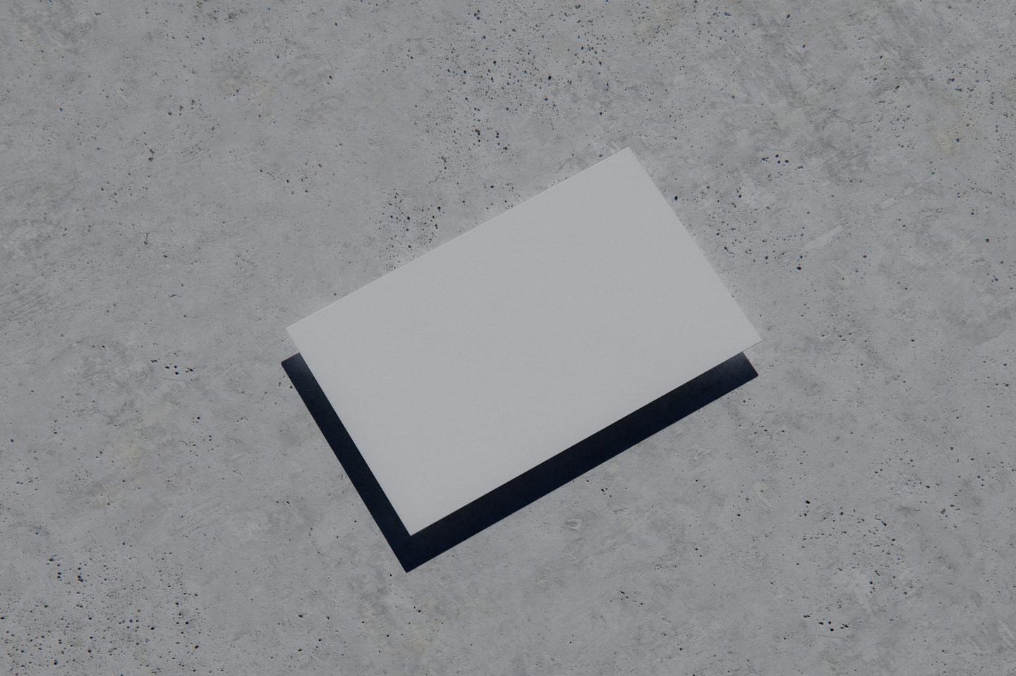 Side-by-side flat lay of six business cards in different colours: navy, black, forest green, red, cream, and orange, each with clean minimal