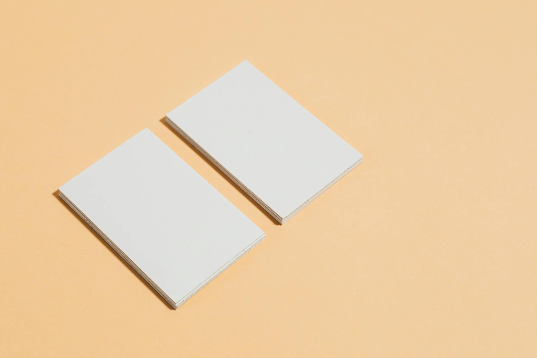Print-ready business card artwork layout showing the 85x55mm format with visible bleed marks, trim lines, and safe zone guides, displayed on