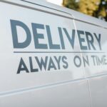 Branded vinyl sticker on a commercial van door in an Australian outdoor setting, showing vibrant colour and clean edge adhesion in bright su