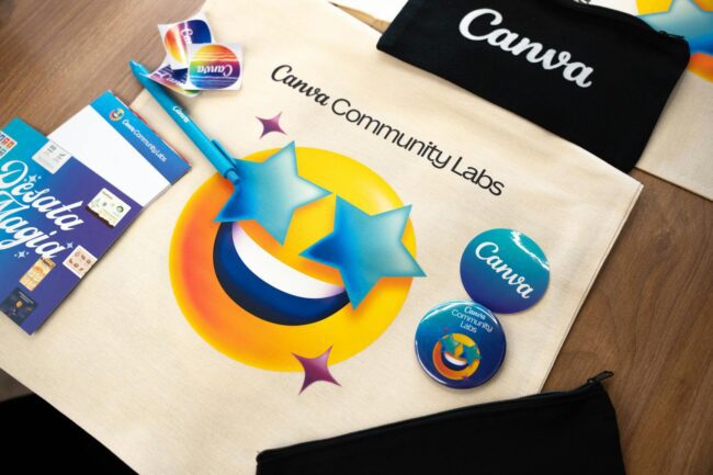 Flat-lay product shot of a custom sticker sheet showing 8 distinct illustrated designs on white backing, placed on a light wood desk with a
