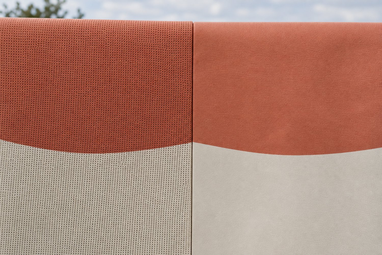 Extreme close-up comparing perforated mesh banner texture against smooth solid vinyl, showing the difference in outdoor banner material surface.