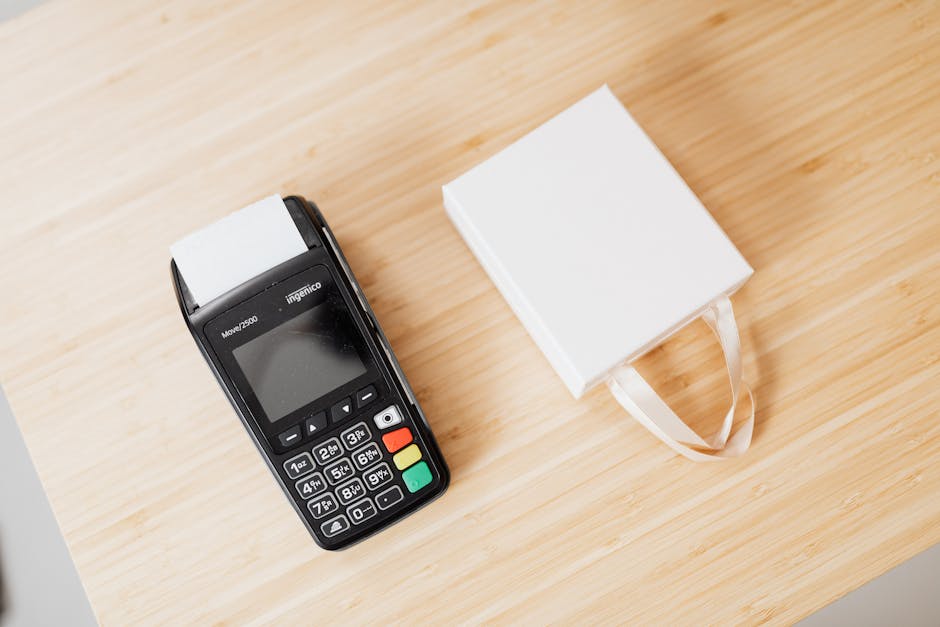 Retail counter with a payment terminal and printed packaging