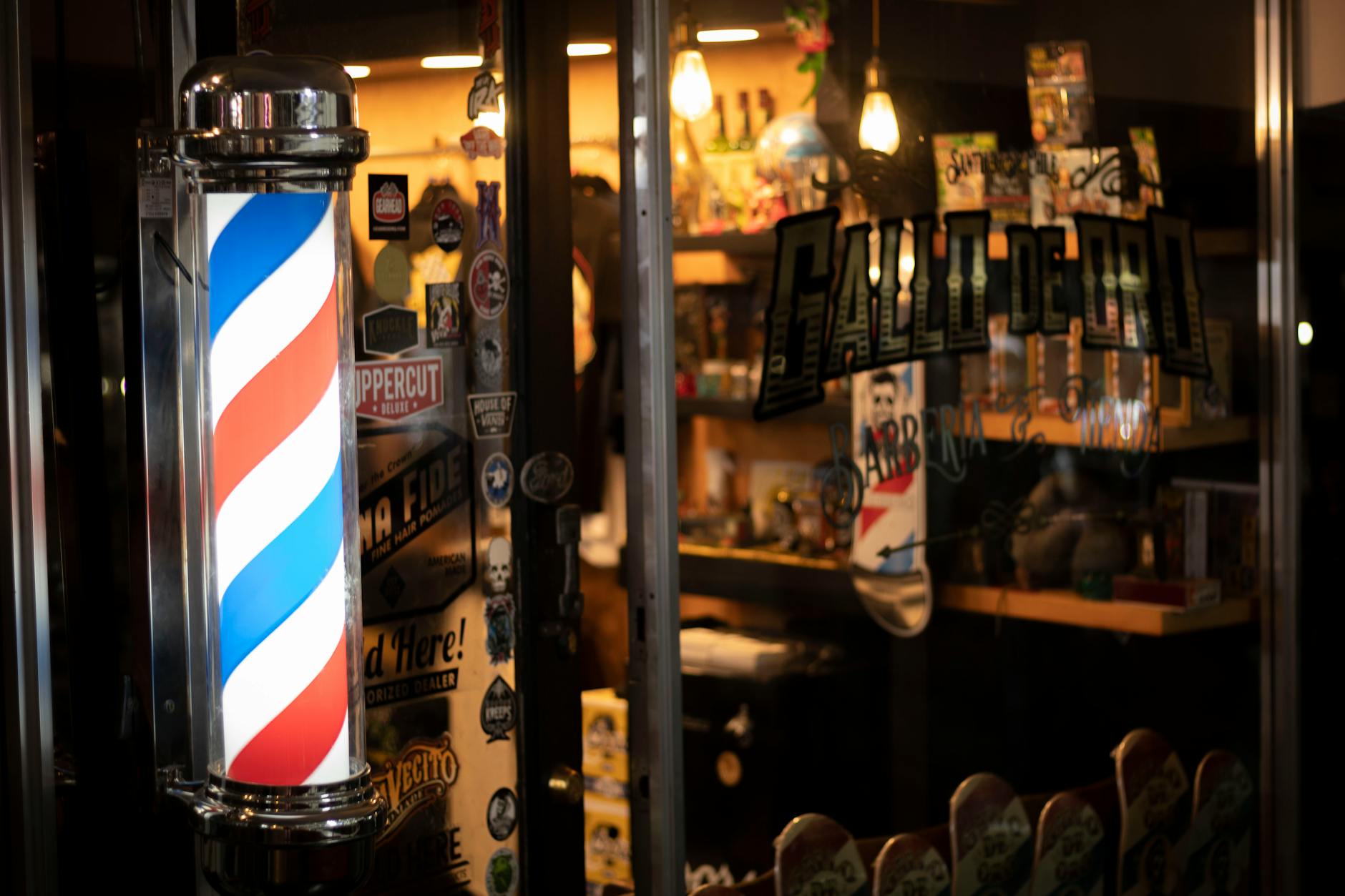 custom vinyl sticker applied to a clean glass shopfront window or door, sharp text and logo in an outdoor retail setting