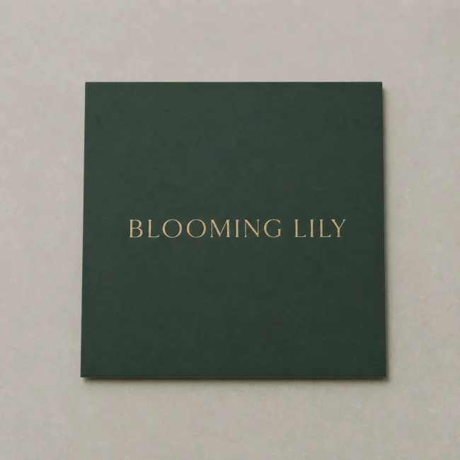 Forest-green business card, dead-flat matte · 350gsm matte-coated stock · full-colour digital print · matte laminate