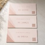 Row of rectangular marketing postcards each with a different abstract code block, illustrating per-recipient variable data personalisation.