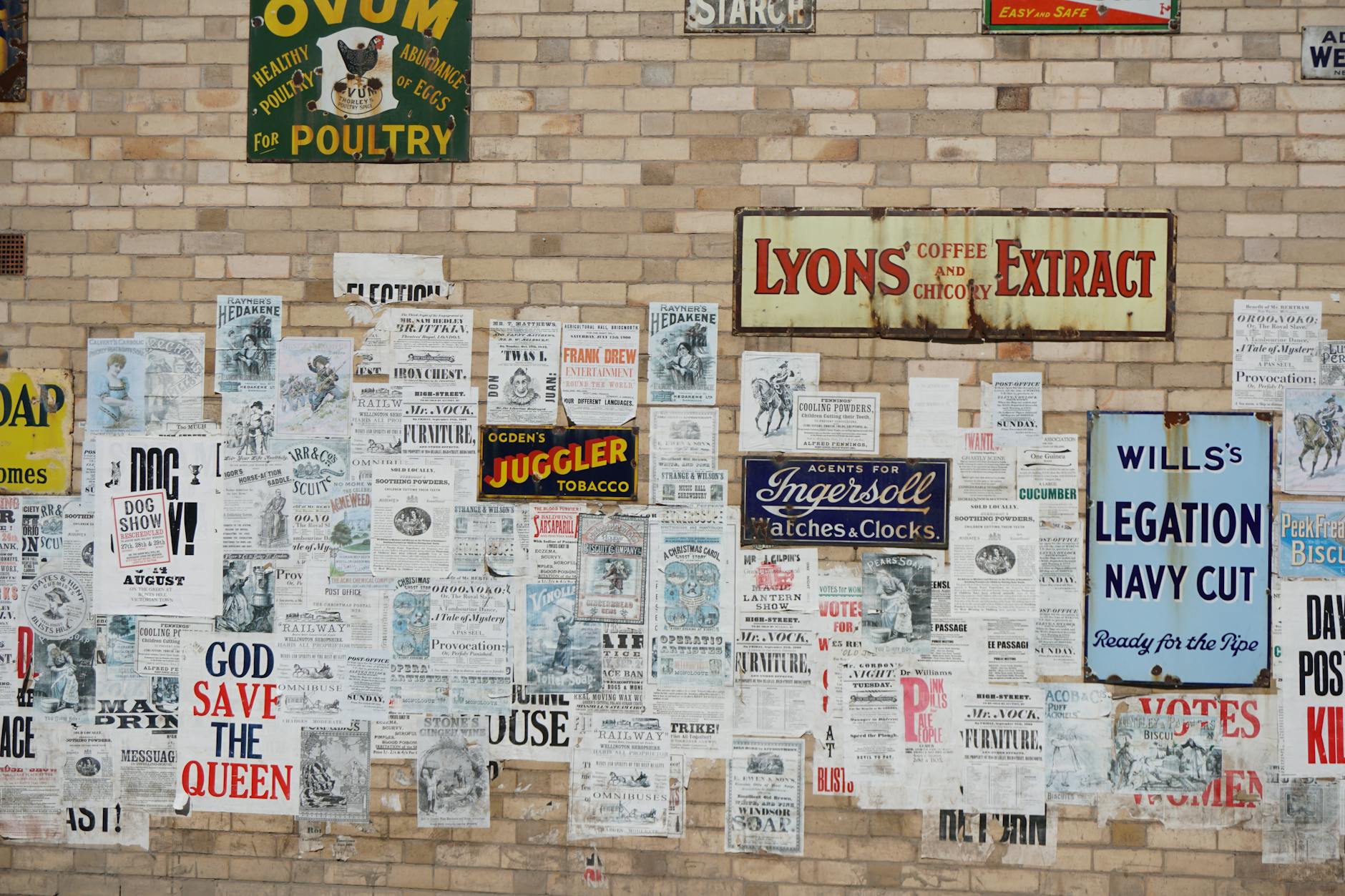 Printed posters in several large-format sizes displayed together, showing the range from A3 up to A1.