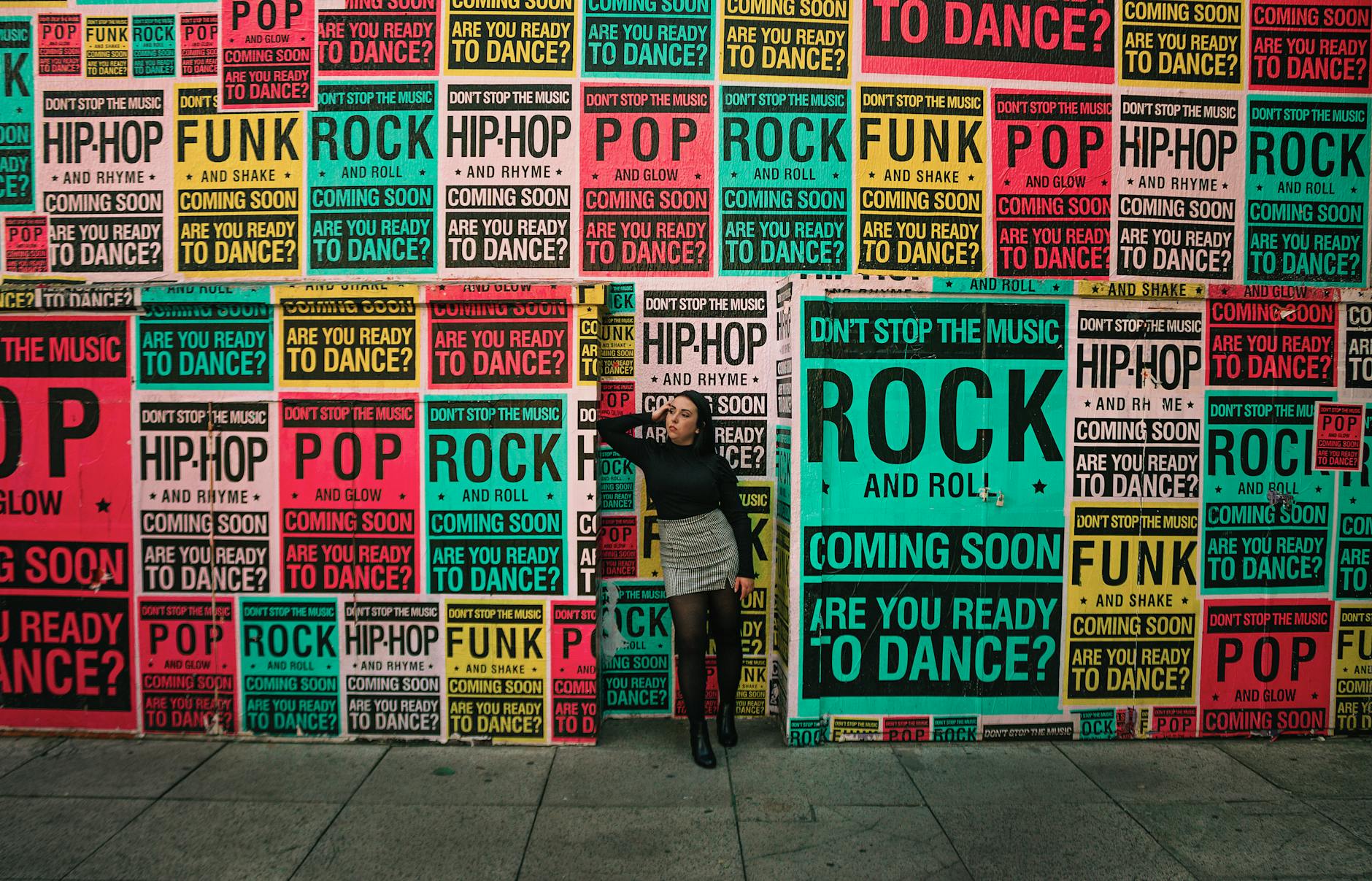 A designer preparing print-ready poster artwork on screen before sending it to print.