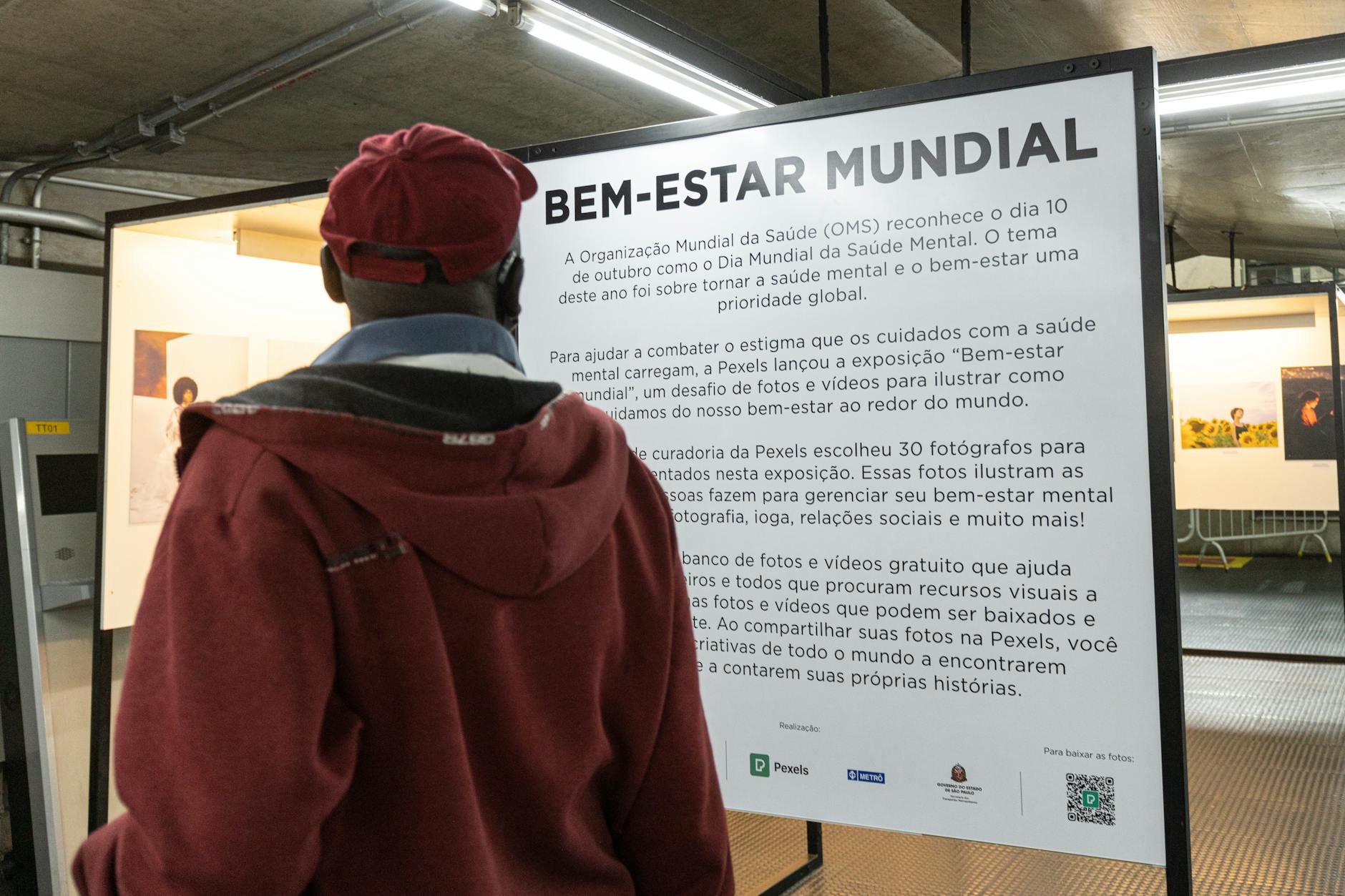 a close-up of A1 posters being reviewed on a light table, showing sharp text and vivid colour on synthetic stock