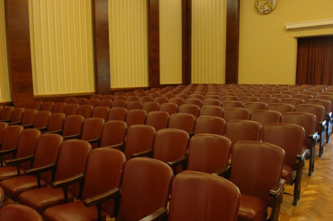 rows of seating in a school auditorium set for an event