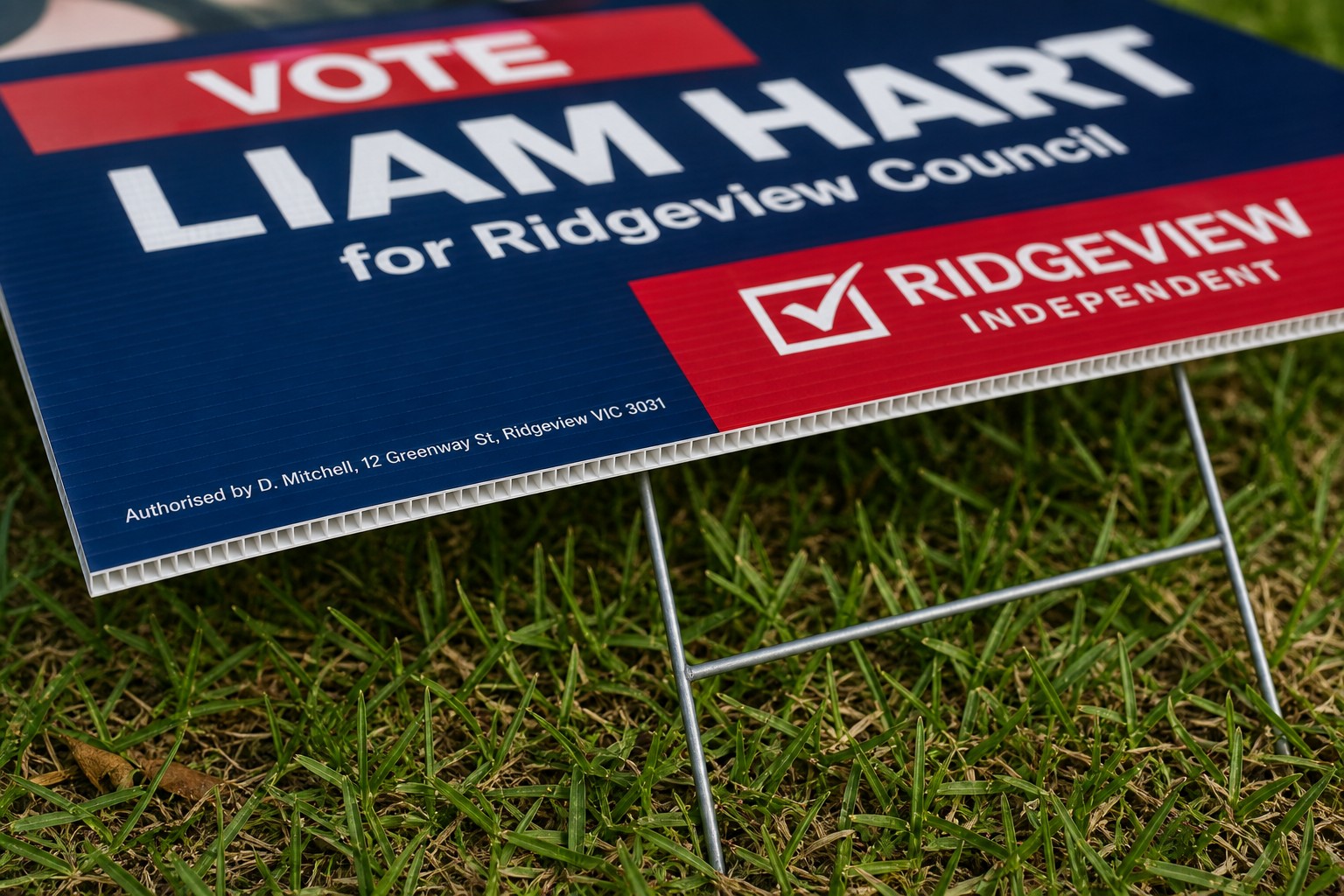 The fluted cut edge of a 5mm corflute election sign, revealing the fine internal corrugated channels that give the board its rigidity