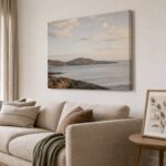 Canvas print on the wall and a framed print on a side table shown together