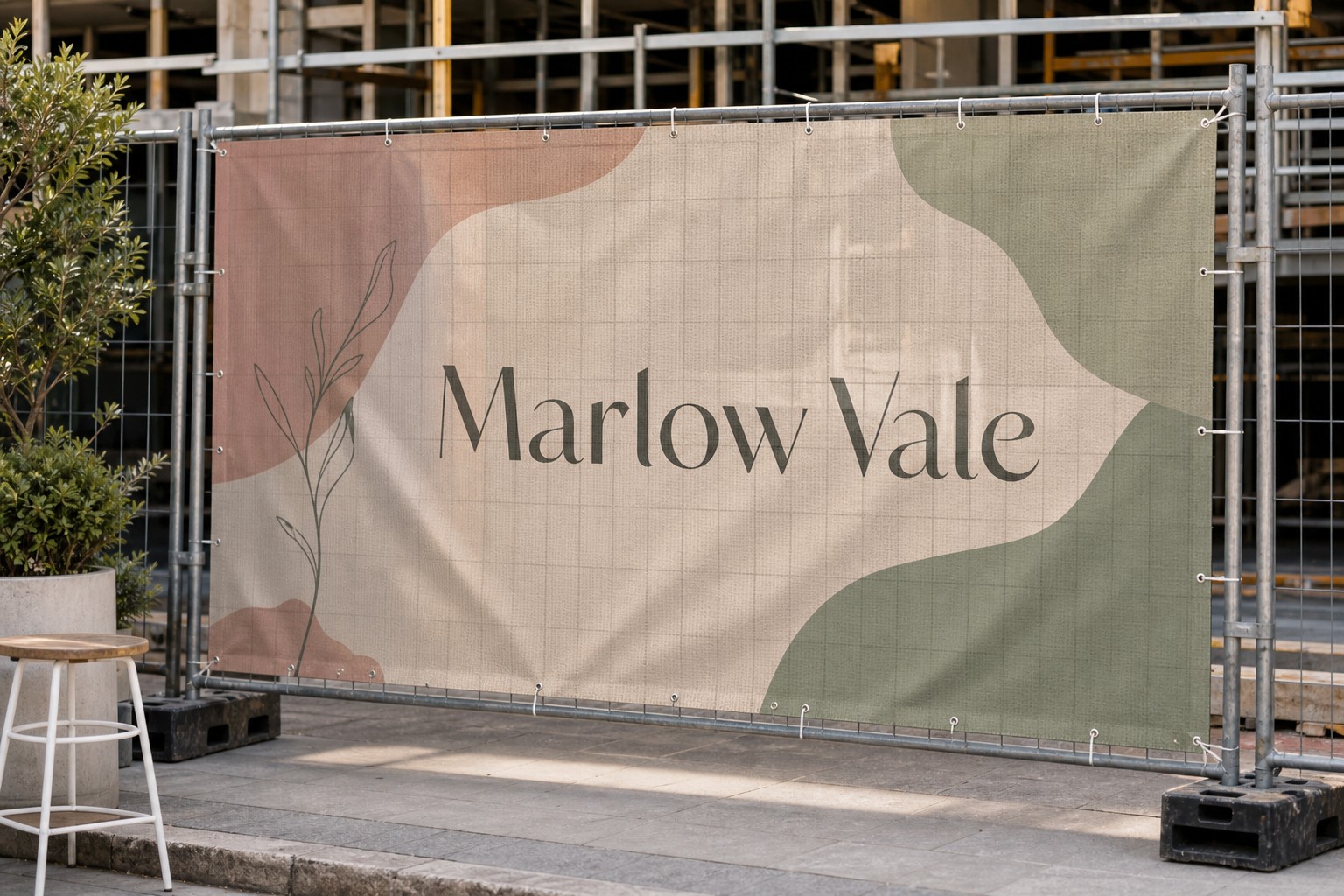 Mesh hoarding banner · 300gsm perforated PVC mesh · full-colour digital print · wind-permeable open weave
