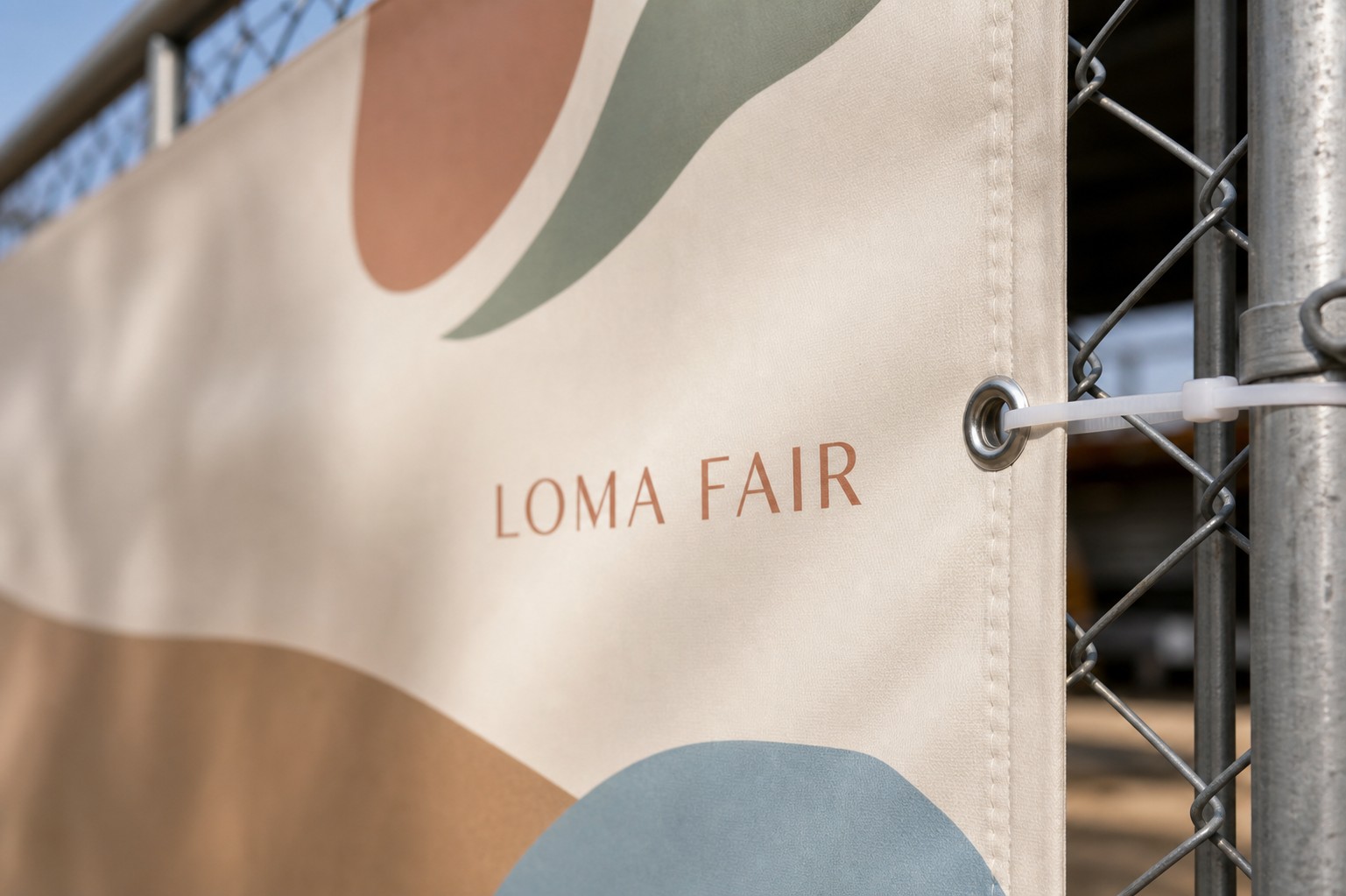 Banner fixing detail · matte PVC · reinforced hem binding · metal eyelet fixed to fence panel
