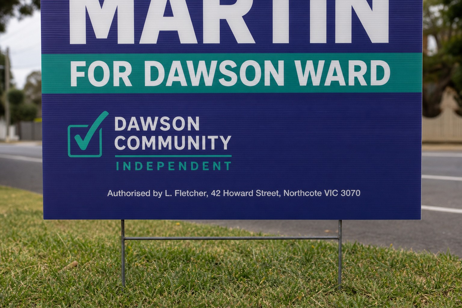 Close-up of the bottom section of a corflute election sign showing a properly formatted authorisation line in a high-contrast sans-serif font