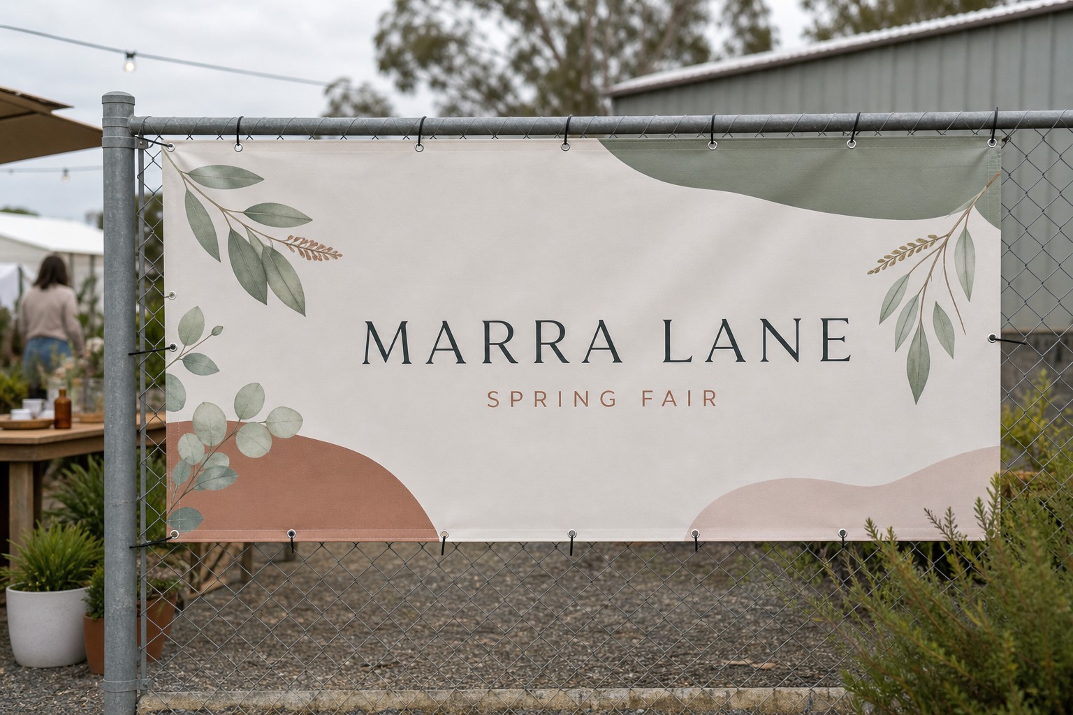 Solid PVC banner on fencing · solid vinyl sheet · full-colour digital print · matte finish with eyelets and cable ties