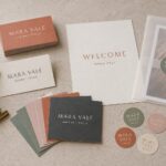 Photographer's print kit flat-lay · artboard and cotton stock · full-colour print · velvet laminate · cards, welcome note, seals and a sleeved print