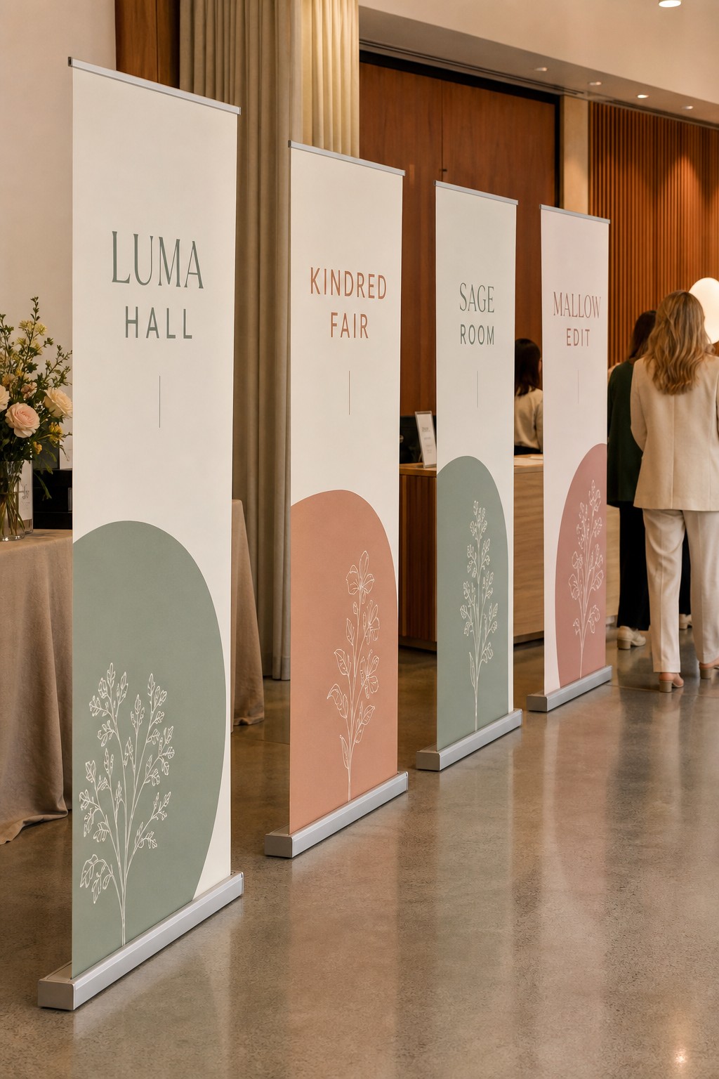 Coordinated retractable banner run · anti-curl satin media · full-colour print · matte finish · conference entrance display