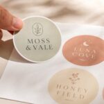 Round circle stickers · 80-micron white vinyl · full-colour digital print · gloss laminate · peel-off backing sheet