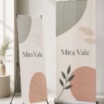 Left X-banner stand on 440gsm polyester · right pull-up retractable banner on vinyl · full-colour print · matte finish