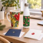Corporate Christmas gifts including Tall Latte 17oz mug, white water bottle, folded cards and kraft gift